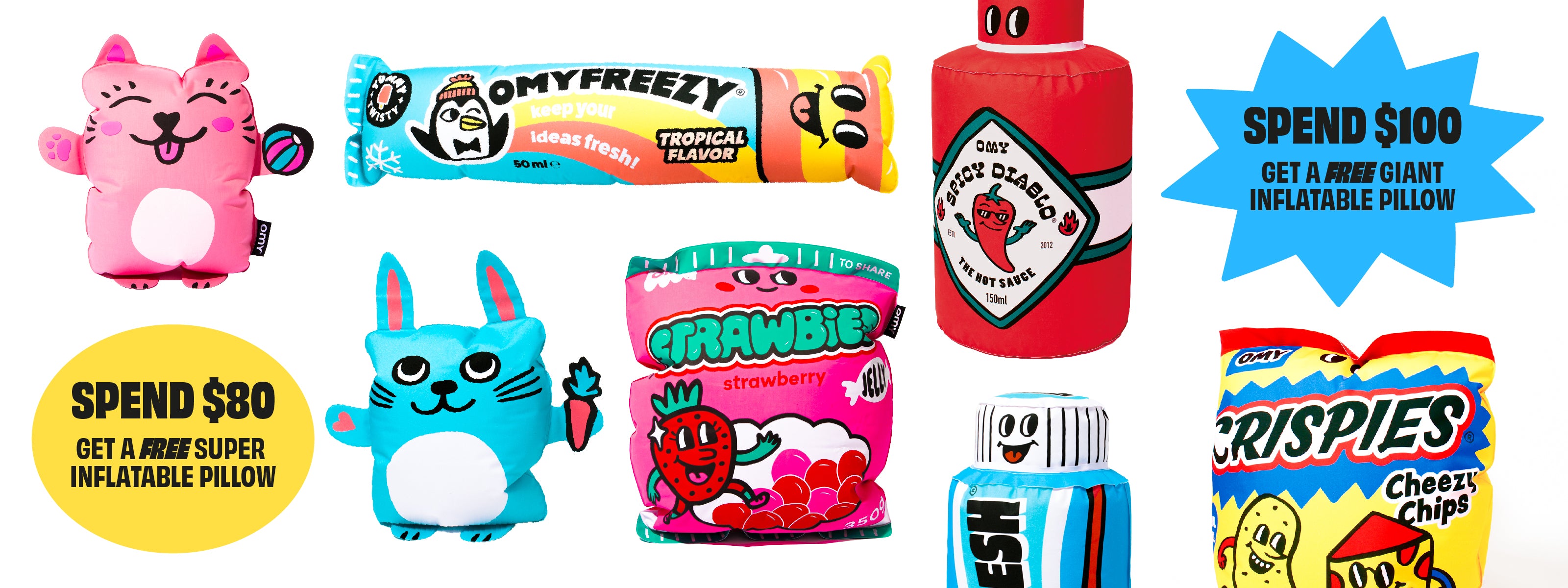 Horizontal promotional banner for OMY featuring colorful inflatable pillows shaped like a pink cat and blue bunny alongside candy-themed products like OMY Freezy tropical flavor tube, Trawbie strawberry candy bag, Crispies Cheezy chips, a red drink bottle and a blue-striped can, with yellow and blue bursts reading 'Spend $80 get a free super inflatable pillow' and 'Spend $100 get a free giant inflatable pillow' on a white background; special offer advertisement for desktop shoppers.