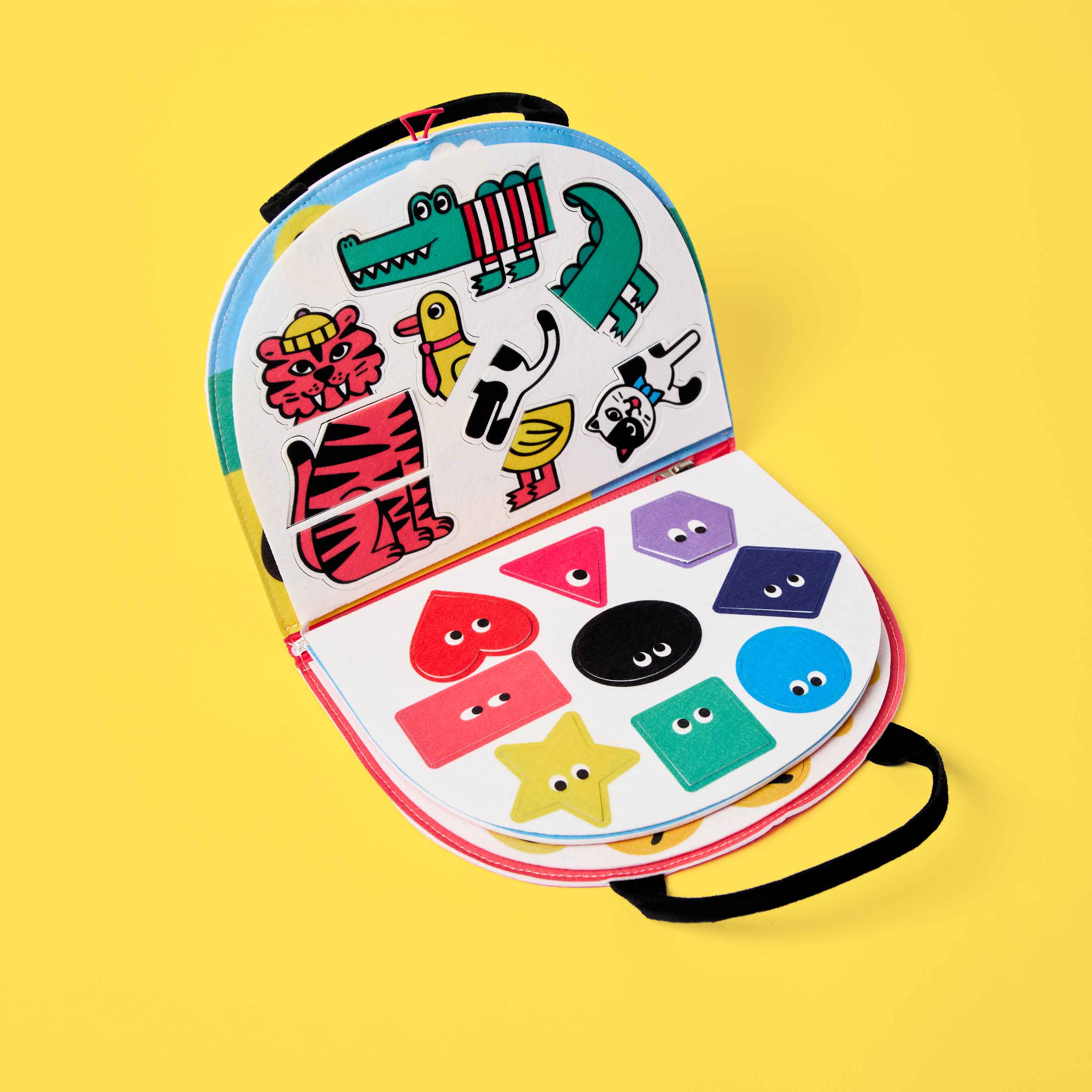 Montessori activity board with colorful geometric felt shapes β early learning toy for preschoolers.