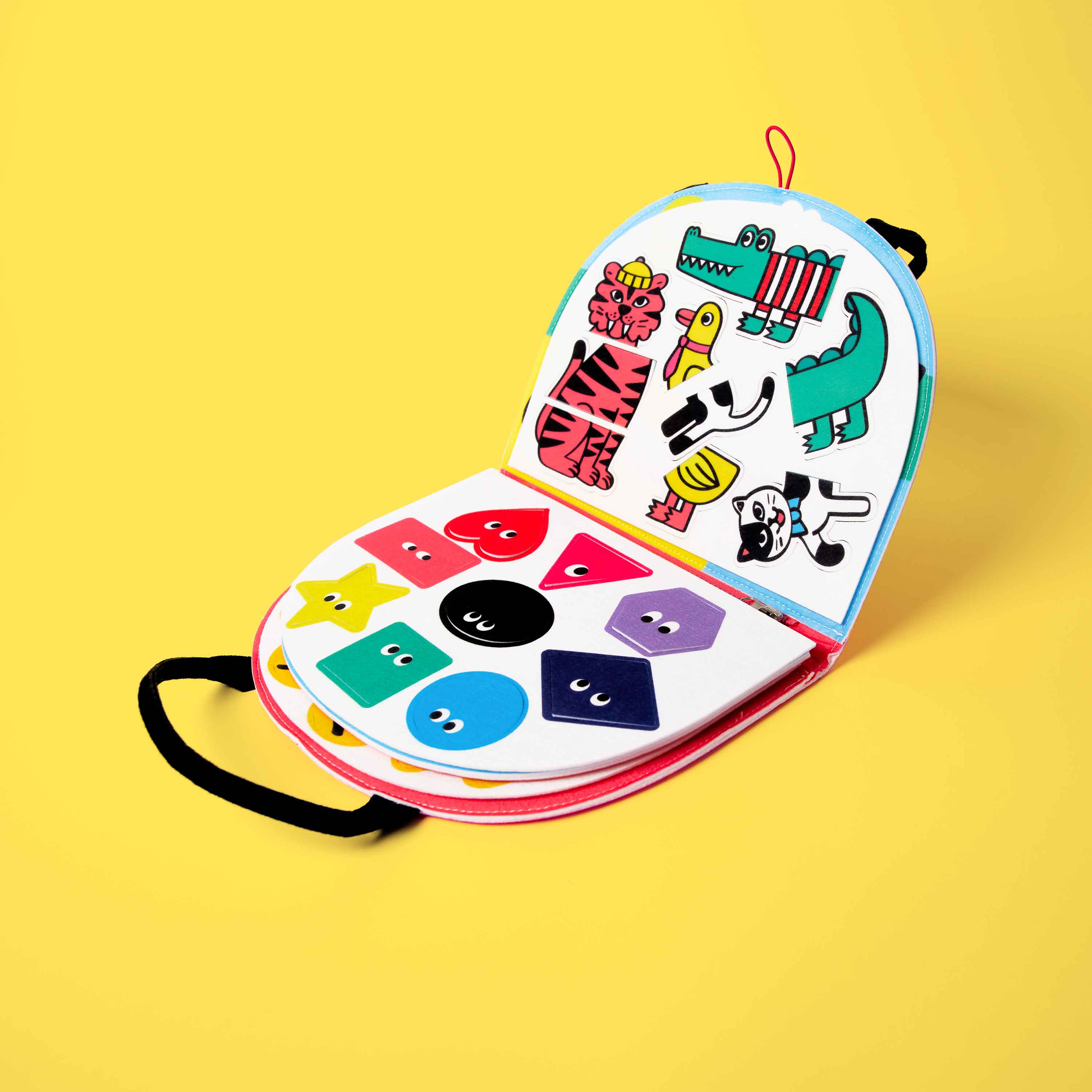 Montessori activity board with colorful geometric felt shapes β early learning toy for preschoolers.