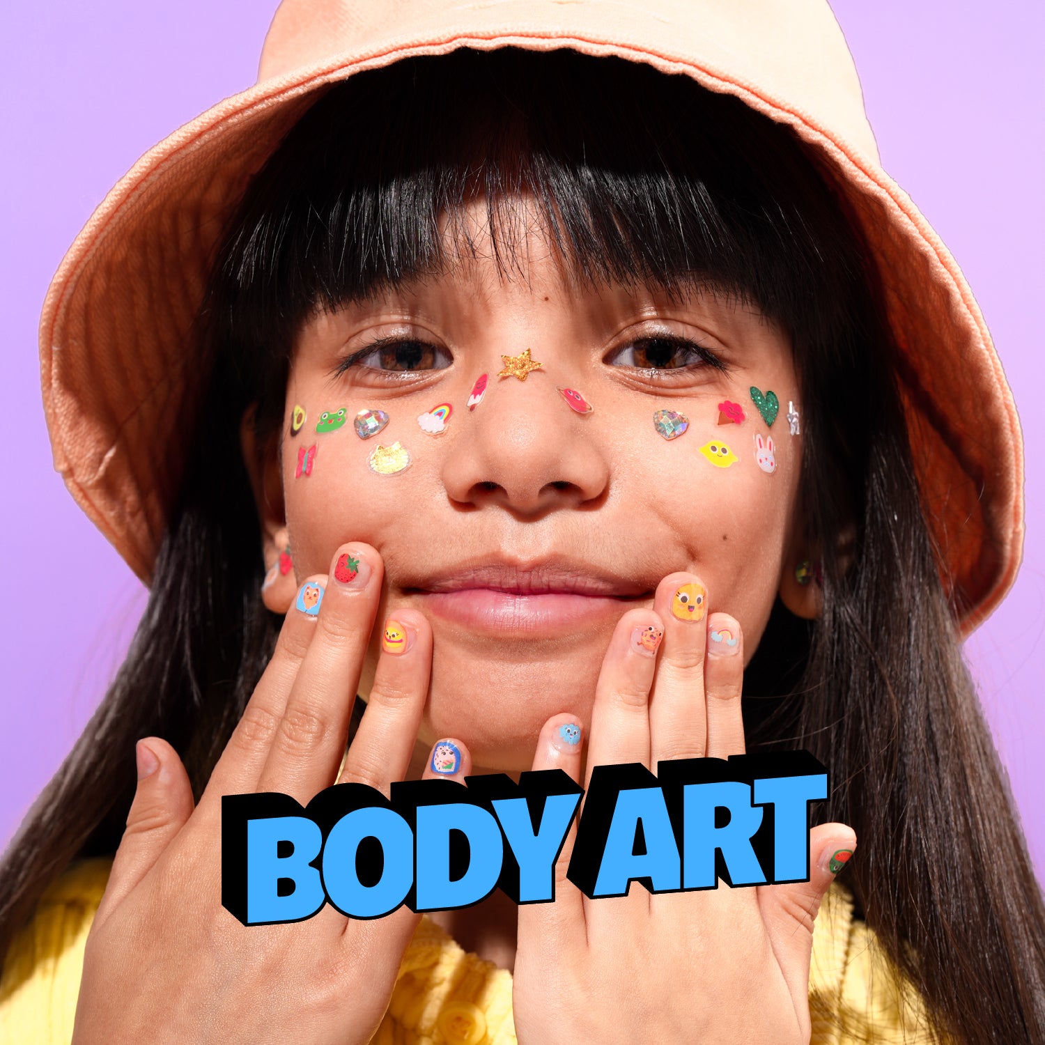 Child using OMY body art Collection with colorful temporary tattoos and creative designs