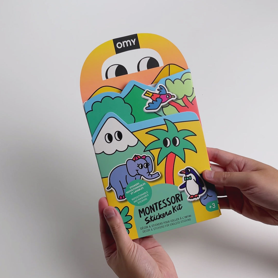 Video demonstration of Montessori animals sticker kit showing repositionable silicone stickers being used on fold-out scenes.