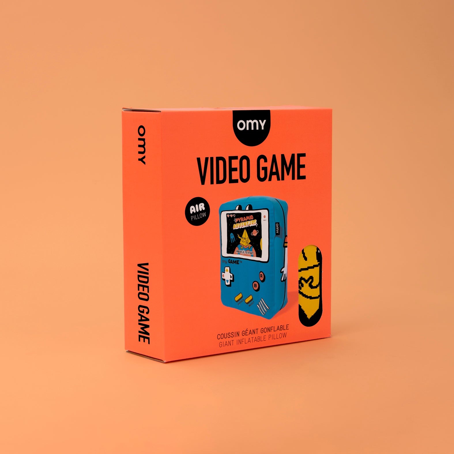 Packaging of Video Game Air Pillow by omy on a beige background