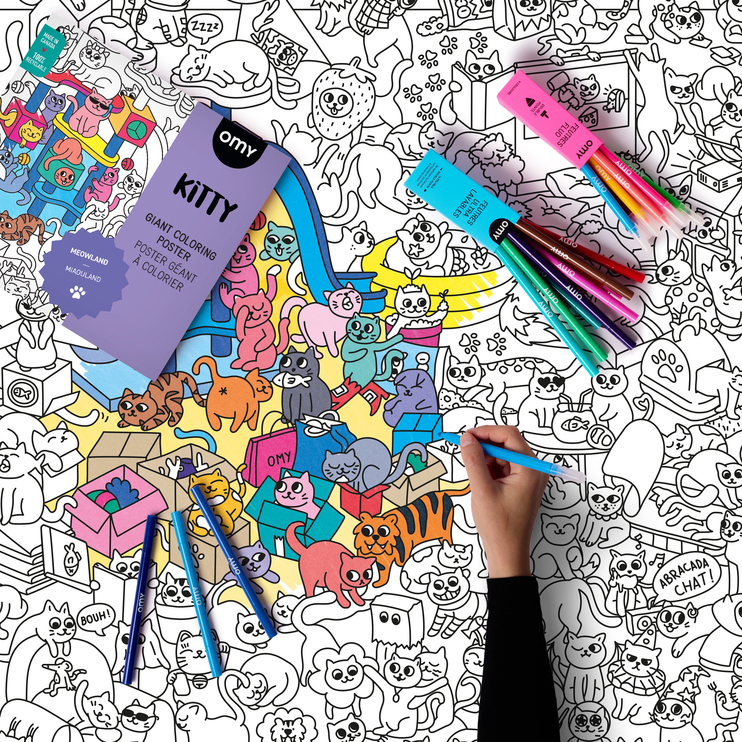 Child coloring OMY Giant Kitty coloring poster with vibrant markers featuring playful cats and whimsical illustrations. OMY Kitty XXL coloring poster with detailed illustrations of cats and colorful fluorescent markers for creative fun.