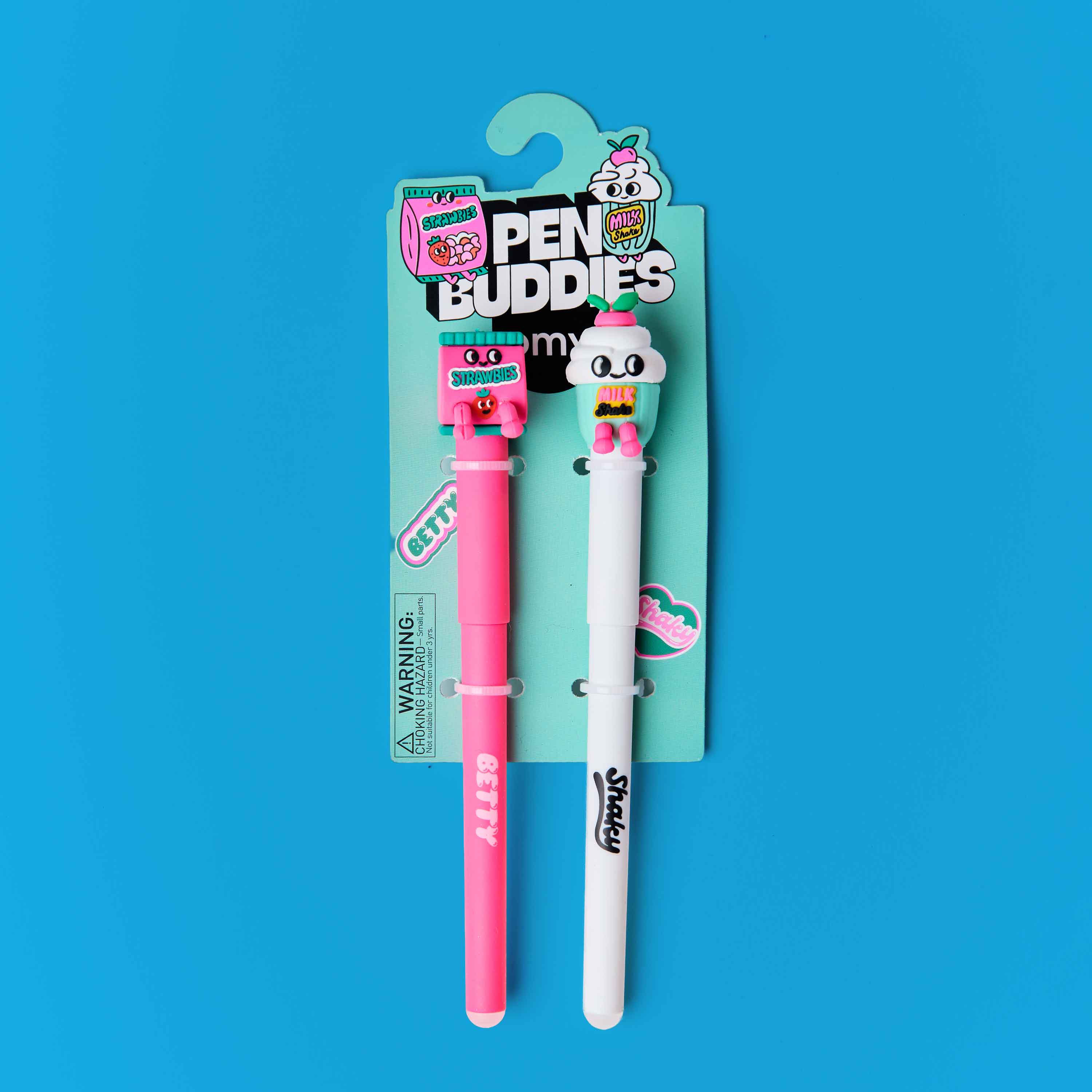 Two buddies pens OMY with packaging on a blue background